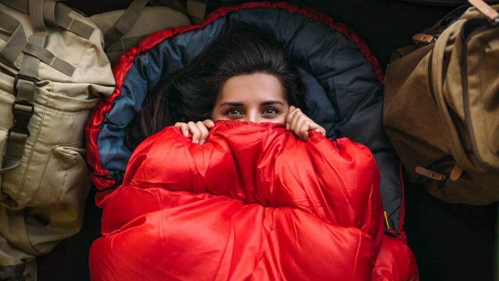 Use high-quality sleeping bag for keeping air mattress warm when camping.