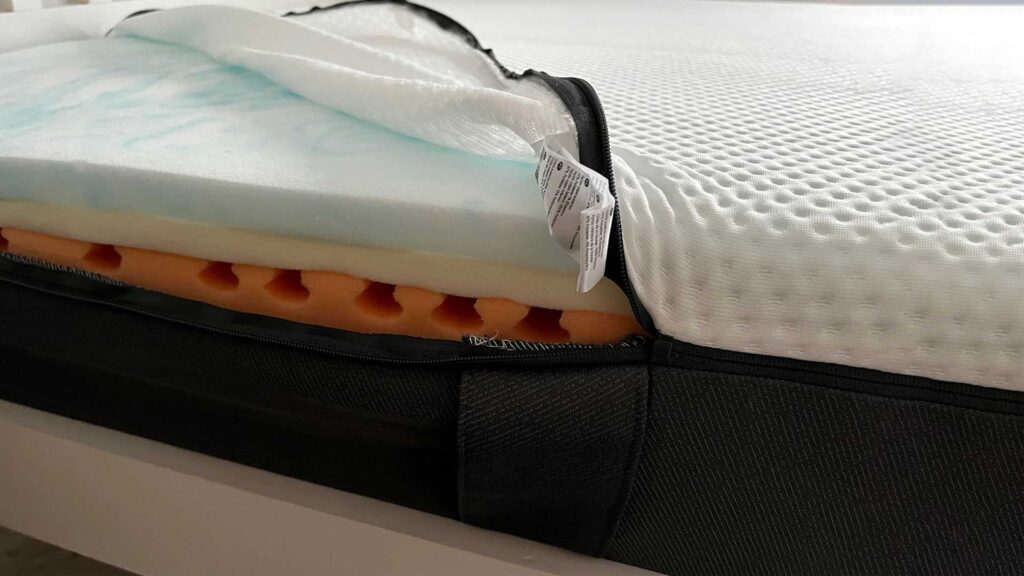 Layers of tempurpedic mattress where bed bugs can live.