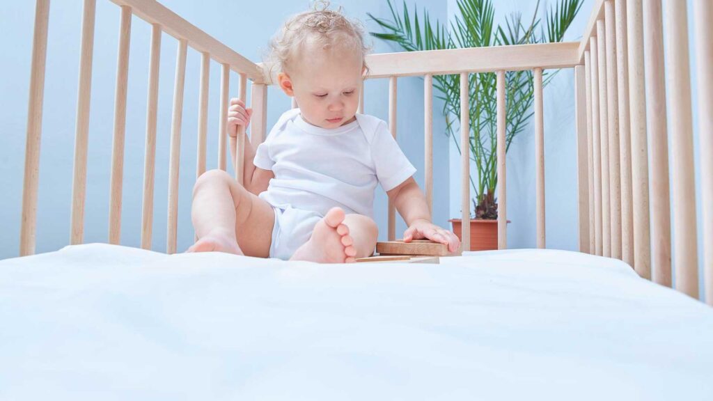 When to flip the baby mattress to the side?