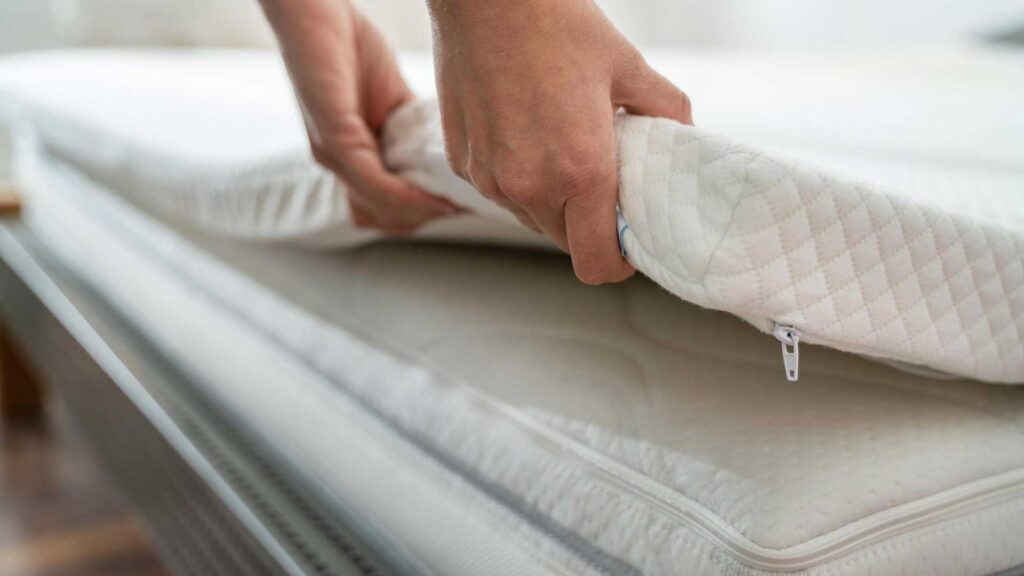 To keep your bed warm try using a mattress topper.